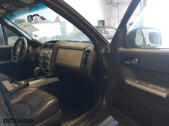 2008 Mercury Mariner with VIN 4M2CU81158KJ14013, listed as a IAAI auction lot 41305863 with 229,672 mi miles. Bid and sale history available at carsss.com. Image 5.