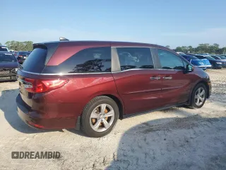 2018 Honda Odyssey EX-L with VIN 5FNRL6H72JB074980, listed as a Copart auction lot 51041465 with 96,240 mi miles and Salvage Title. Bid and sale history available at DreamBid. Image 3.