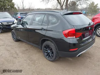 2015 BMW X1 xDrive28i with VIN WBAVL1C57FVY28856, listed as a IAAI auction lot 41695075 with 96,264 mi miles. Bid and sale history available at carsss.com. Image 3.