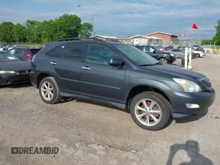 2008 Lexus RX with VIN 2T2HK31U28C063629, listed as a IAAI auction lot 42174790 with 204,595 mi miles. Bid and sale history available at carsss.com. Image 13.