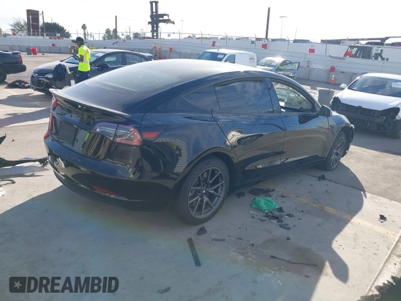 2019 Tesla Model 3 Mid Range with VIN 5YJ3E1EA0KF399082, listed as a IAAI auction lot 41697100 with 138,998 mi miles and . Bid and sale history available at carsss.com. Image 4.
