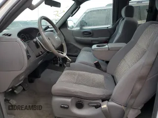 2003 Ford F-150 XL with VIN 1FTRX17L53NB90331, listed as a Copart auction lot 76686124 with 0 mi miles and Salvage Title. Bid and sale history available at carsss.com. Image 7.