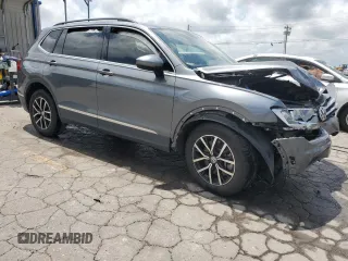 2021 Volkswagen Tiguan SE with VIN 3VV3B7AX5MM158656, listed as a Copart auction lot 61593815 with 68,774 mi miles and Salvage title. Bid and sale history available at DreamBid. Image 4.