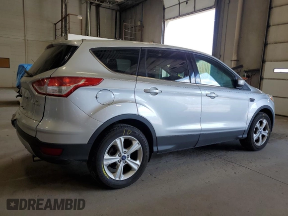 2013 Ford Escape SE with VIN 1FMCU0GXXDUB10035, listed as a Copart auction lot 56817785 with 130,497 mi miles and Salvage title. Bid and sale history available at DreamBid. Image 3.
