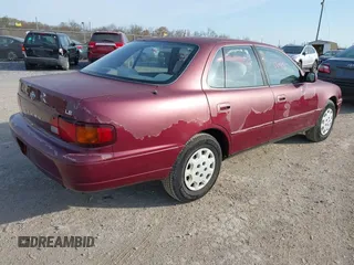 1996 Toyota Camry DX z VIN 4T1BG12K3TU662835, wystawiony jako IAAI lot #42060645 z przebiegiem 195 600 mil mil oraz . Historia ofert i sprzedaży dostępna na DreamBid. Obrazek 4.