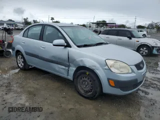 2009 Kia Rio LX with VIN KNADE223396443465, listed as a Copart auction lot 51370975 with 110,952 mi miles and Salvage Title. Bid and sale history available at carsss.com. Image 4.