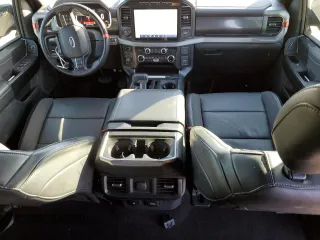 2021 Ford F-150 Raptor with VIN 1FTFW1RG3MFC62242, listed as a Copart auction lot 85596594 with 33,497 mi miles and Salvage Title. Bid and sale history available at carsss.com. Image 8.