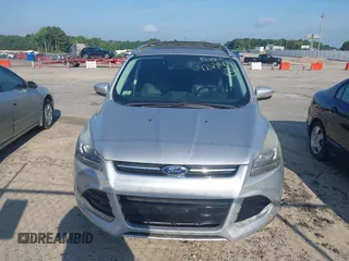 2013 Ford Escape Titanium with VIN 1FMCU0J94DUB58785, listed as a IAAI auction lot 42631897 with 163,037 mi miles and . Bid and sale history available at DreamBid. Image 6.