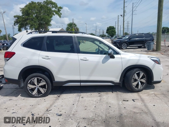 2021 Subaru Forester Touring with VIN JF2SKAXC8MH574427, listed as a IAAI auction lot 42529701 with 11,409 mi miles and . Bid and sale history available at DreamBid. Image 14.