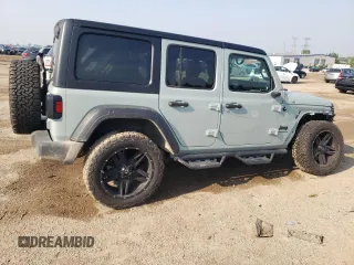 2023 Jeep Wrangler Willys with VIN 1C4HJXDG9PW615072, listed as a Copart auction lot 59606805 with 72,969 mi miles and Salvage title. Bid and sale history available at DreamBid. Image 3.