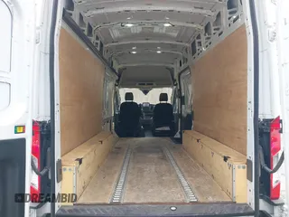 2020 Ford Transit Cargo with VIN 1FTBW3XG0LKB42773, listed as a IAAI auction lot 41564980 with 57,124 mi miles and . Bid and sale history available at carsss.com. Image 20.