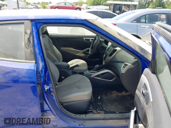 2012 Hyundai Veloster w/Gray Int with VIN KMHTC6AD7CU050444, listed as a IAAI auction lot 42170272 with 121,478 mi miles and . Bid and sale history available at DreamBid. Image 5.