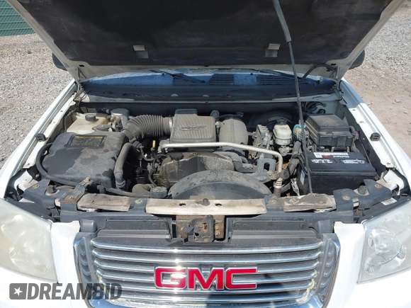 2008 GMC Envoy SLE2 with VIN 1GKDT13S682112642, listed as a IAAI auction lot 42062008 with 162,467 mi miles. Bid and sale history available at carsss.com. Image 10.