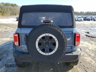 2023 Ford Bronco with VIN 1FMEE5DP0PLB17111, listed as a Copart auction lot 86588374 with 26,093 mi miles and Salvage Title. Bid and sale history available at DreamBid. Image 6.
