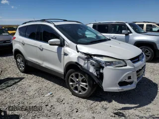 2013 Ford Escape SEL z VIN 1FMCU9H9XDUC15081, wystawiony jako Copart lot #58034165 z przebiegiem 166 612 mil mil oraz Szkoda całkowita • Salvage title. Historia ofert i sprzedaży dostępna na DreamBid. Obrazek 4.