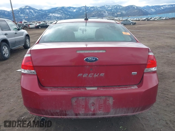 2009 Ford Focus SE z VIN 1FAHP35N39W205218, wystawiony jako IAAI lot #41788041 z przebiegiem Nie podano mil oraz . Historia ofert i sprzedaży dostępna na DreamBid. Obrazek 16.