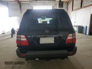 2004 Toyota Land Cruiser z VIN JTEHT05J042063603, wystawiony jako Copart lot #50366005 z przebiegiem 226 355 mil mil oraz Tytuł czysty. Historia ofert i sprzedaży dostępna na DreamBid. Obrazek 6.