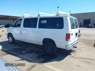 2014 Ford Econoline Passenger XL with VIN 1FBNE3BL7EDA37146, listed as a IAAI auction lot 41871526 with 139,387 mi miles. Bid and sale history available at carsss.com. Image 3.