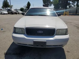 2011 Ford Police Interceptor with VIN 2FABP7BV4BX167977, listed as a Copart auction lot 61819025 with 104,769 mi miles and Salvage title. Bid and sale history available at DreamBid. Image 5.