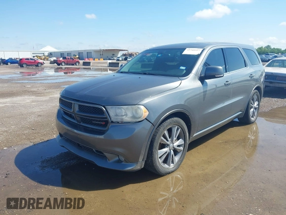 2013 Dodge Durango R/T z VIN 1C4SDHCT7DC564802, wystawiony jako IAAI lot #42348957 z przebiegiem 178 354 mil mil oraz . Historia ofert i sprzedaży dostępna na DreamBid. Obrazek 2.