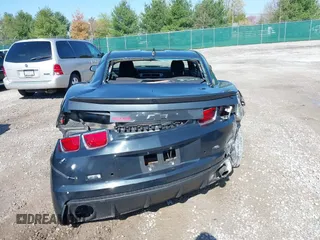2013 Chevrolet Camaro LS z VIN 2G1FA1E35D9156989, wystawiony jako IAAI lot #41999082 z przebiegiem 168 616 mil mil oraz . Historia ofert i sprzedaży dostępna na DreamBid. Obrazek 16.