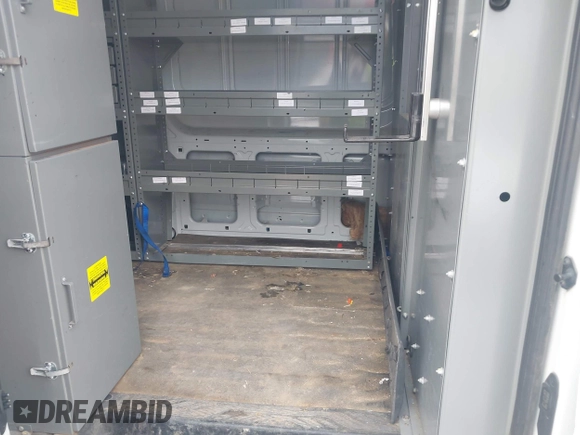 2018 Ford Transit with VIN 1FTYR1CM1JKA69797, listed as a IAAI auction lot 42282537 with 184,498 mi miles and . Bid and sale history available at DreamBid. Image 8.