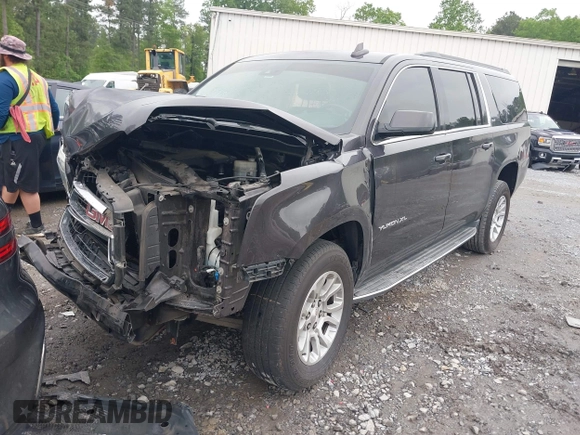 2015 GMC Yukon XL SLE z VIN 1GKS1GKC8FR507436, wystawiony jako IAAI lot #42113696 z przebiegiem Nie podano mil oraz . Historia ofert i sprzedaży dostępna na DreamBid. Obrazek 17.