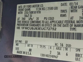 2014 Ford Escape Titanium with VIN 1FMCU9J93EUC72752, listed as a IAAI auction lot 41827668 with 91,194 mi miles and . Bid and sale history available at DreamBid. Image 9.