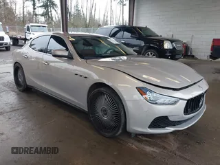 2017 Maserati Ghibli with VIN ZAM57XSLXH1238134, listed as a IAAI auction lot 41871754 with 34,776 mi miles. Bid and sale history available at carsss.com. Image 1.