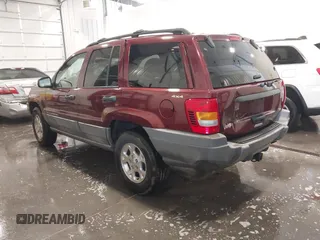 2000 Jeep Grand Cherokee Laredo z VIN 1J4GW48N8YC151600, wystawiony jako IAAI lot #42178535 z przebiegiem 71 207 mil mil oraz . Historia ofert i sprzedaży dostępna na DreamBid. Obrazek 3.