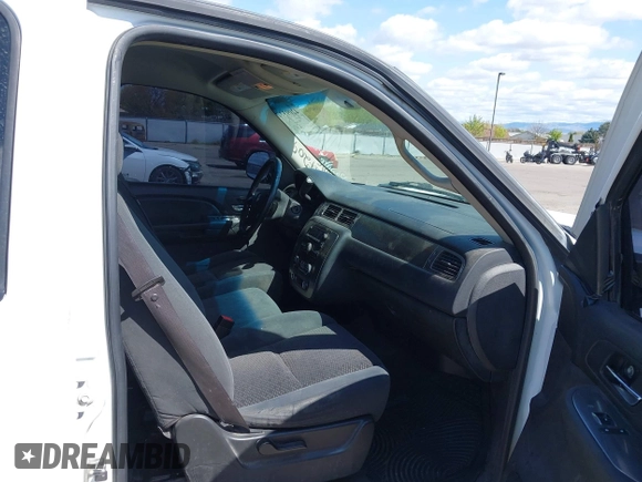 2007 Chevrolet Tahoe LS with VIN 1GNFC13C77J404051, listed as a IAAI auction lot 42093772 with 213,729 mi miles and . Bid and sale history available at DreamBid. Image 5.