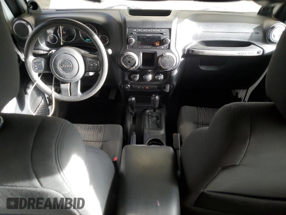 2011 Jeep Wrangler Sport with VIN 1J4AA2D12BL555530, listed as a Copart auction lot 42049915 with 83,349 mi miles and Salvage Title. Bid and sale history available at carsss.com. Image 8.
