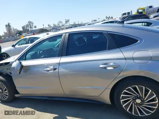 2021 Hyundai Sonata Hybrid SEL with VIN KMHL34JJ7MA026559, listed as a IAAI auction lot 41657589 with 119,019 mi miles. Bid and sale history available at carsss.com. Image 15.