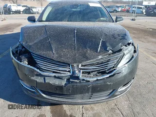 2013 Lincoln MKZ z VIN 3LN6L2G94DR817880, wystawiony jako IAAI lot #41790309 z przebiegiem 167 761 mil mil oraz . Historia ofert i sprzedaży dostępna na DreamBid. Obrazek 6.