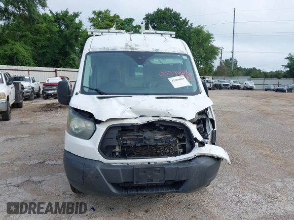 2015 Ford Transit Cargo with VIN 1FTNR1CM2FKB29029, listed as a IAAI auction lot 42286089 with 130,845 mi miles and . Bid and sale history available at DreamBid. Image 12.