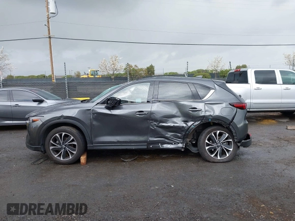 2023 Mazda CX-5 2.5 S Premium Package with VIN JM3KFBDM4P0174901, listed as a IAAI auction lot 41940271 with 25,805 mi miles. Bid and sale history available at carsss.com. Image 14.
