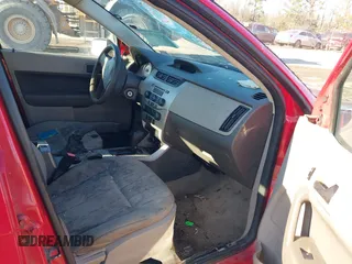 2008 Ford Focus SE with VIN 1FAHP35N18W272267, listed as a IAAI auction lot 41003854 with 239,062 mi miles. Bid and sale history available at carsss.com. Image 5.