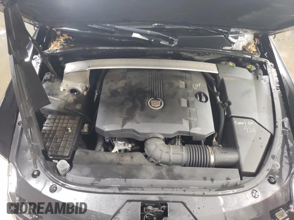 2013 Cadillac CTS Premium z VIN 1G6DS5E3XD0160729, wystawiony jako Copart lot #44633195 z przebiegiem 74 697 mil mil oraz Szkoda całkowita • Salvage title. Historia ofert i sprzedaży dostępna na DreamBid. Obrazek 11.