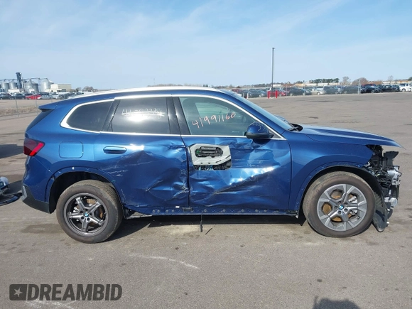 2025 BMW X1 xDrive28i z VIN WBX73EF01S5110817, wystawiony jako IAAI lot #41991160 z przebiegiem 1 287 mil mil oraz . Historia ofert i sprzedaży dostępna na DreamBid. Obrazek 14.