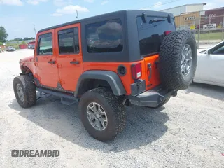 2015 Jeep Wrangler Unlimited Rubicon z VIN 1C4BJWFG4FL598033, wystawiony jako IAAI lot #42435523 z przebiegiem 134 202 mil mil oraz . Historia ofert i sprzedaży dostępna na DreamBid. Obrazek 3.