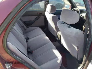 1996 Toyota Camry DX z VIN JT2BG12K4T0363844, wystawiony jako IAAI lot #42215996 z przebiegiem 214 452 mil mil oraz . Historia ofert i sprzedaży dostępna na DreamBid. Obrazek 8.