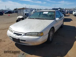1996 Ford Thunderbird LX with VIN 1FALP62W3TH135238, listed as a IAAI auction lot 41692746 with 136,464 mi miles and . Bid and sale history available at DreamBid. Image 2.