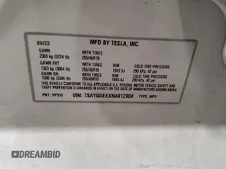 2022 Tesla Model Y Long Range z VIN 7SAYGDEEXNA012904, wystawiony jako Copart lot #57492865 z przebiegiem 31 294 mil mil oraz Szkody całkowita. Historia ofert i sprzedaży dostępna na DreamBid. Obrazek 13.