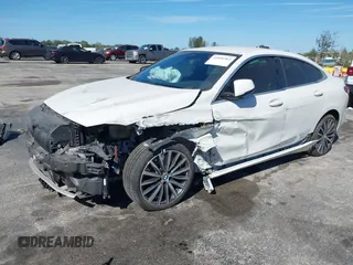 2021 BMW 2 Series 228i xDrive with VIN WBA73AK07M7G50238, listed as a IAAI auction lot 41856961 with 28,451 mi miles and . Bid and sale history available at carsss.com. Image 6.