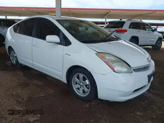 2007 Toyota Prius with VIN JTDKB20U877575305, listed as a IAAI auction lot 42130018 with 245,146 mi miles and . Bid and sale history available at DreamBid. Image 1.
