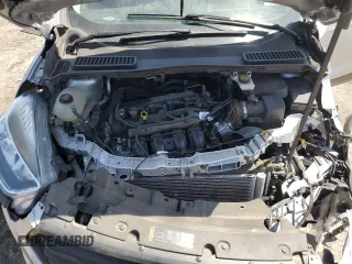 2017 Ford Escape S z VIN 1FMCU0F73HUD06275, wystawiony jako Copart lot #62875465 z przebiegiem 56 780 mil mil oraz Szkoda całkowita • Salvage title. Historia ofert i sprzedaży dostępna na DreamBid. Obrazek 12.