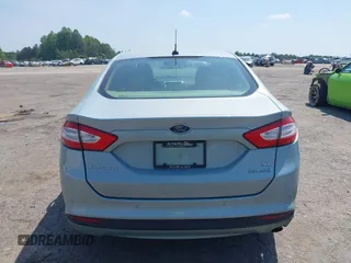 2014 Ford Fusion SE Hybrid with VIN 3FA6P0LU8ER251057, listed as a IAAI auction lot 42150589 with 188,192 mi miles and . Bid and sale history available at DreamBid. Image 16.