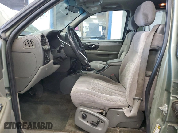 2004 GMC Envoy SLE with VIN 1GKDS13S442417232, listed as a Copart auction lot 51821225 with 242,945 mi miles and Salvage Title. Bid and sale history available at carsss.com. Image 7.