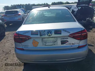 2017 Volkswagen Passat S z VIN 1VWAT7A30HC009964, wystawiony jako IAAI lot #42181146 z przebiegiem 118 855 mil mil oraz . Historia ofert i sprzedaży dostępna na DreamBid. Obrazek 17.