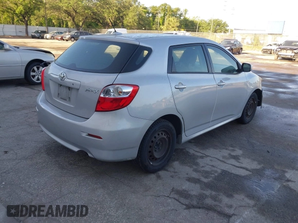 2009 Toyota Matrix with VIN 2T1KU40E59C106253, listed as a IAAI auction lot 41974823 with 126,155 mi miles. Bid and sale history available at carsss.com. Image 4.